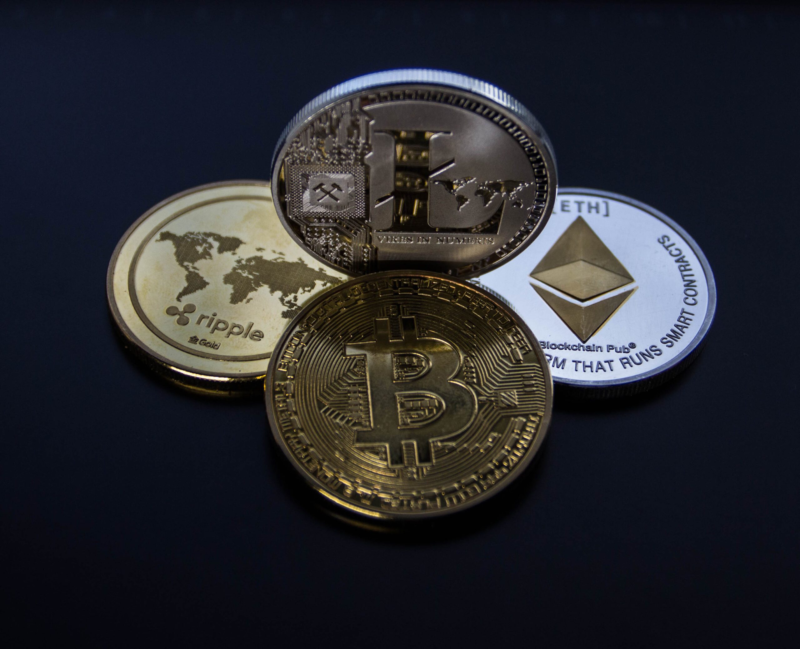 What Are The Tax Implications Of Buying, Selling, And Trading Cryptocurrencies?